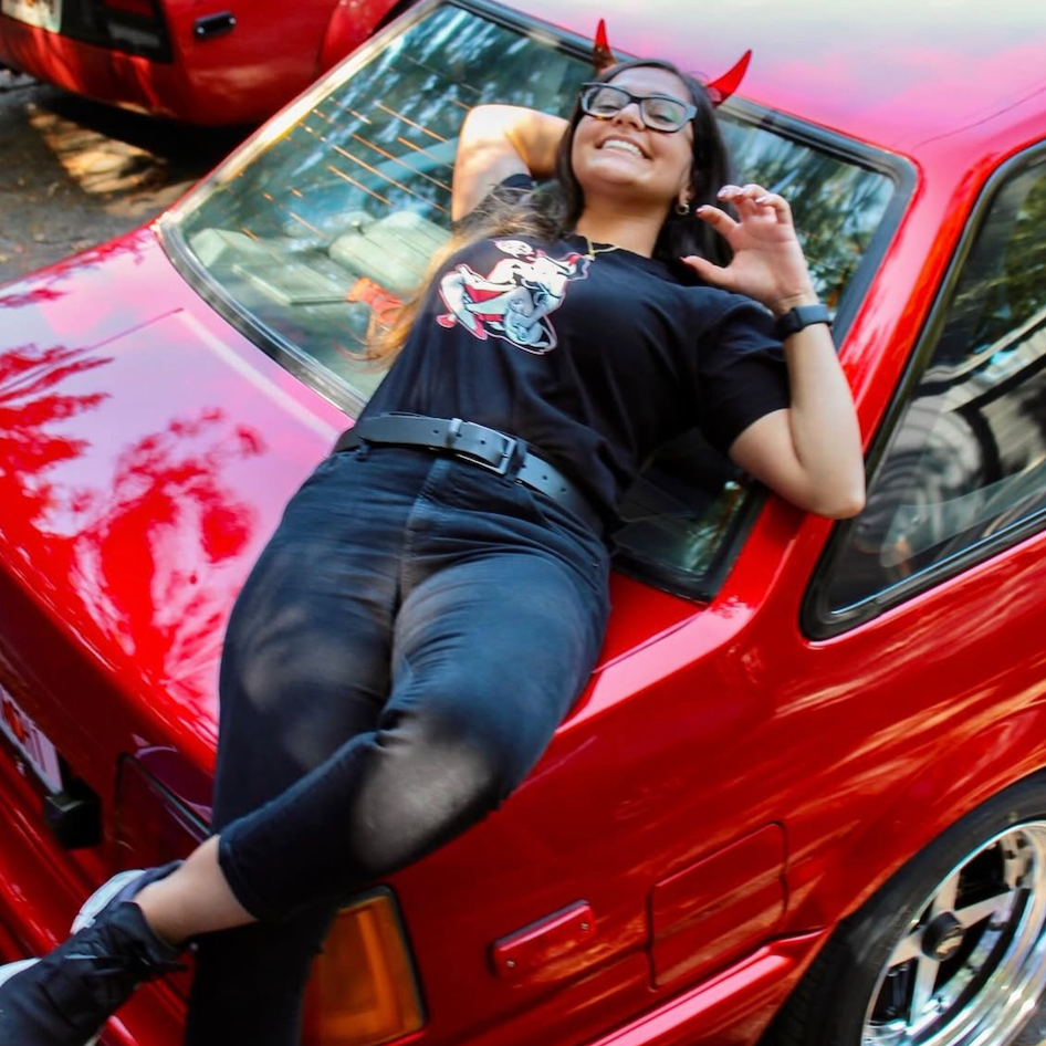 Black cotton unisex T-shirt with BLK CLD Vintage Malpractice design on front only in white and red ink and Black Cloud red devil horns