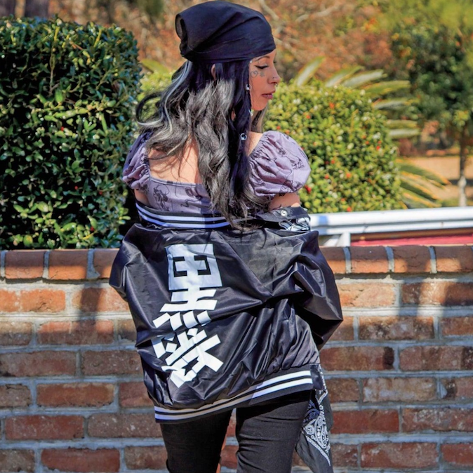 Black unisex nylon lined baseball jacket with promise (Yakusoku) design on front and black cloud Japanese kanji letters on the back in white